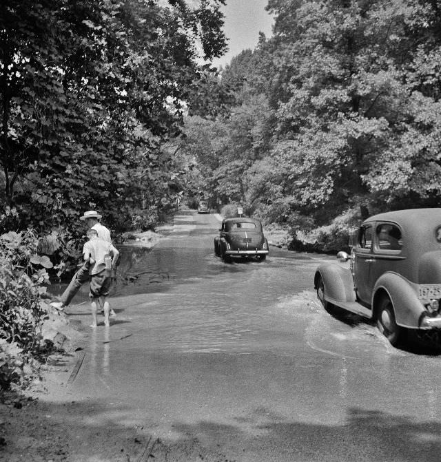 #35 Waders at an automobile Ford in Rock Creek Park. Washington, D.C., June 1942