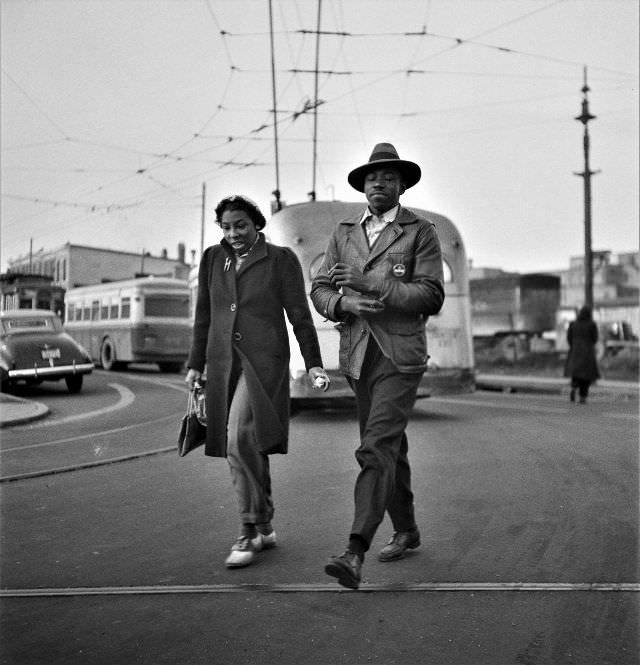 #49 Workers hurrying to catch a conveyance for work at seven a.m., Baltimore, Maryland, April 1943