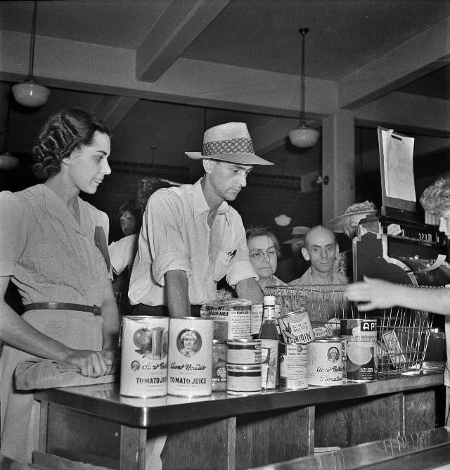 #6 Cashier checking out a customer’s purchases at the Will That Be All?: Giant Food shopping center, Washington, D.C., June 1942