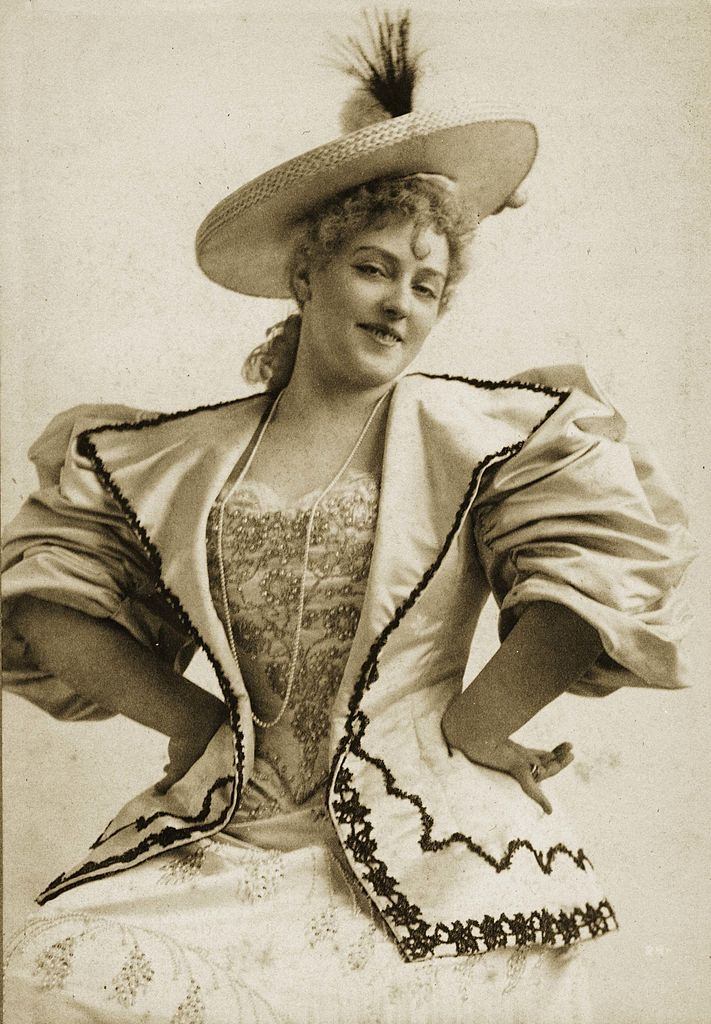 #11 Lillian Russell poses on a tiger skin rug during a visit to the city in 1893.