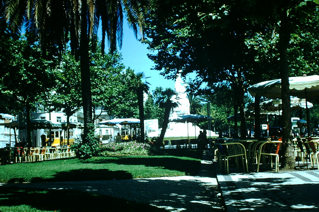 #21 Parkway Sidewalk Cafe and Statue, Lisbon, 1950s.