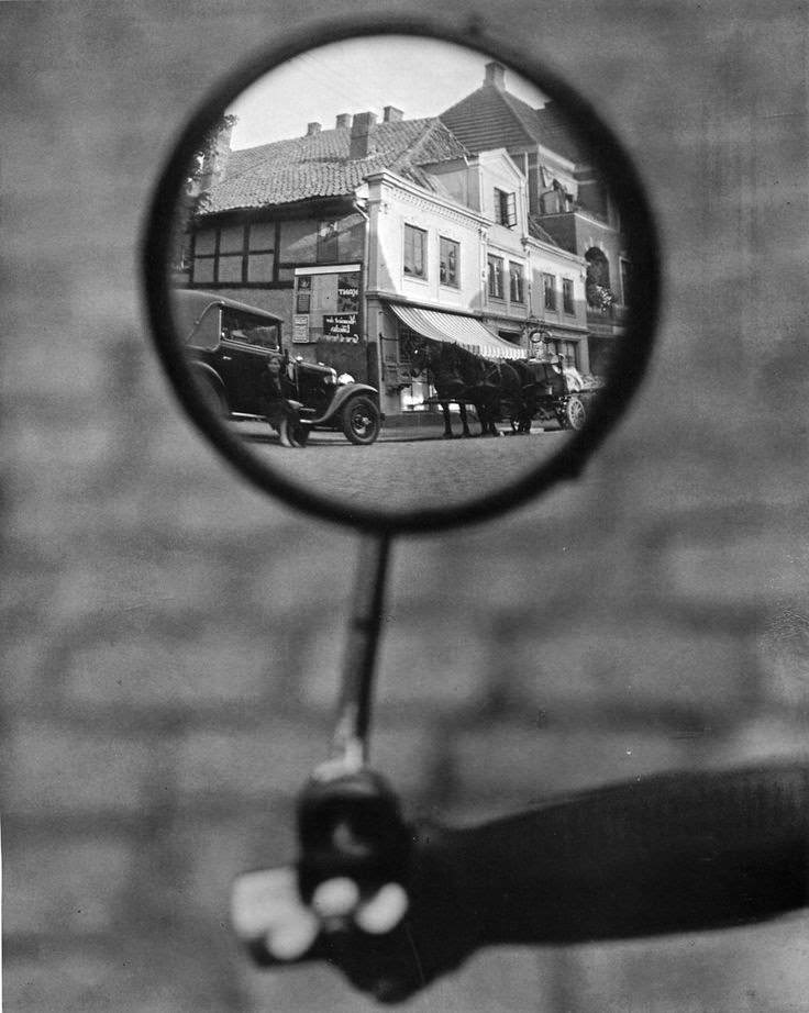 #23 Reflection in a motorcycle mirror, Berlin, c. 1929