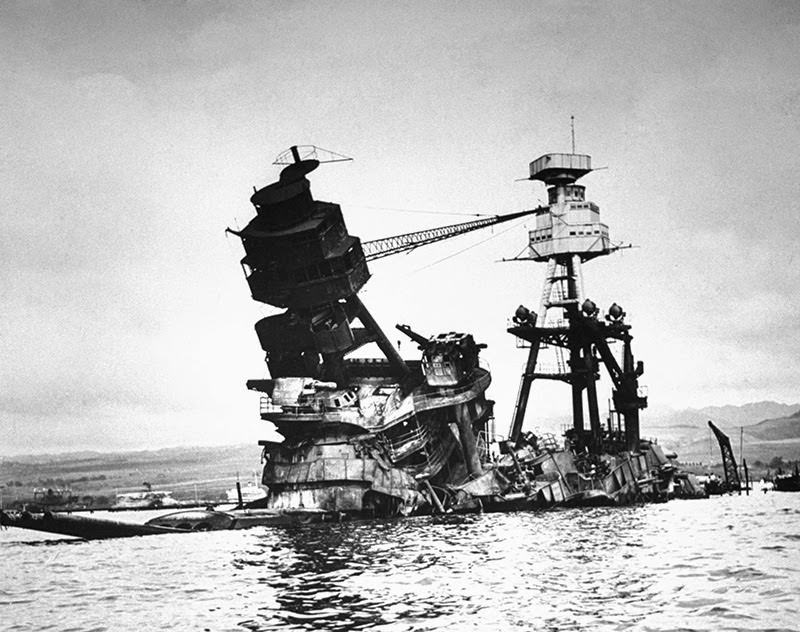 #1 Exposed wreckage of the American battleship U.S.S. Arizona, most of which is now resting at the bottom of Pearl Harbor following a surprise Japanese attack on Dec. 7, 1941.