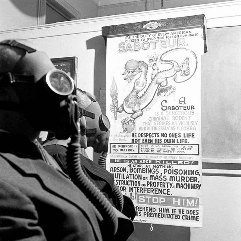 #5 A poster at the Brooklyn Navy Yard calls for vigilance, December 1941.