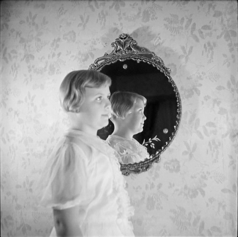 #26 Louise Buckner standing in front of a mirror