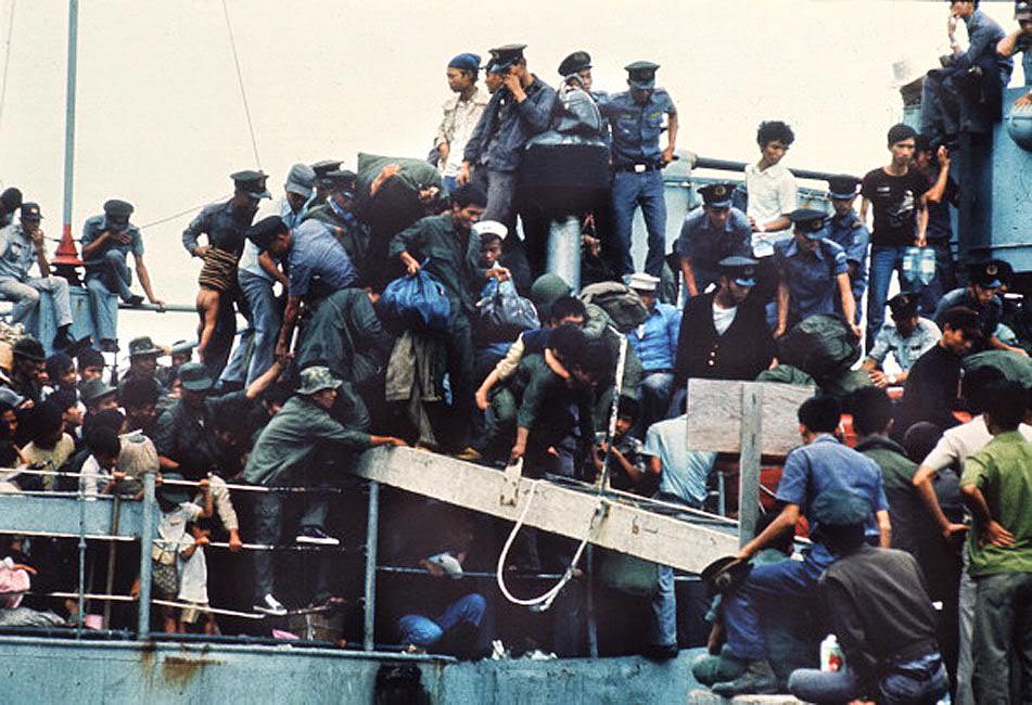 Jam-packed with more than 7,000 refugees, the South Vietnamese Navy ship HQ-504 arrives at Vung Tau port, the South Vietnam’ s most popular sea resort, and now the only port city in the Government hands.