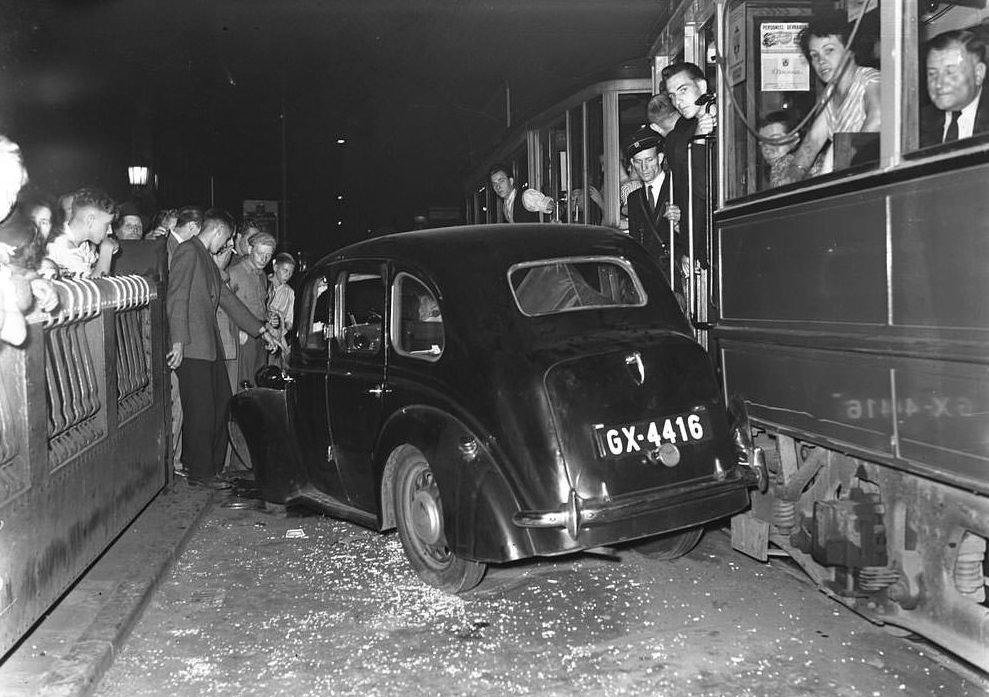 #15 A car accident in Amsterdam, 1940s.