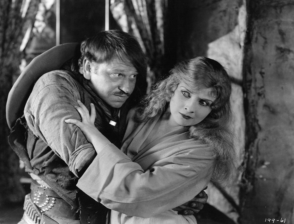 #15 Alice Terry tries to rebuff the advances of Wallace Beery n a scene from the MGM film ‘The Great Divide’, 1925.