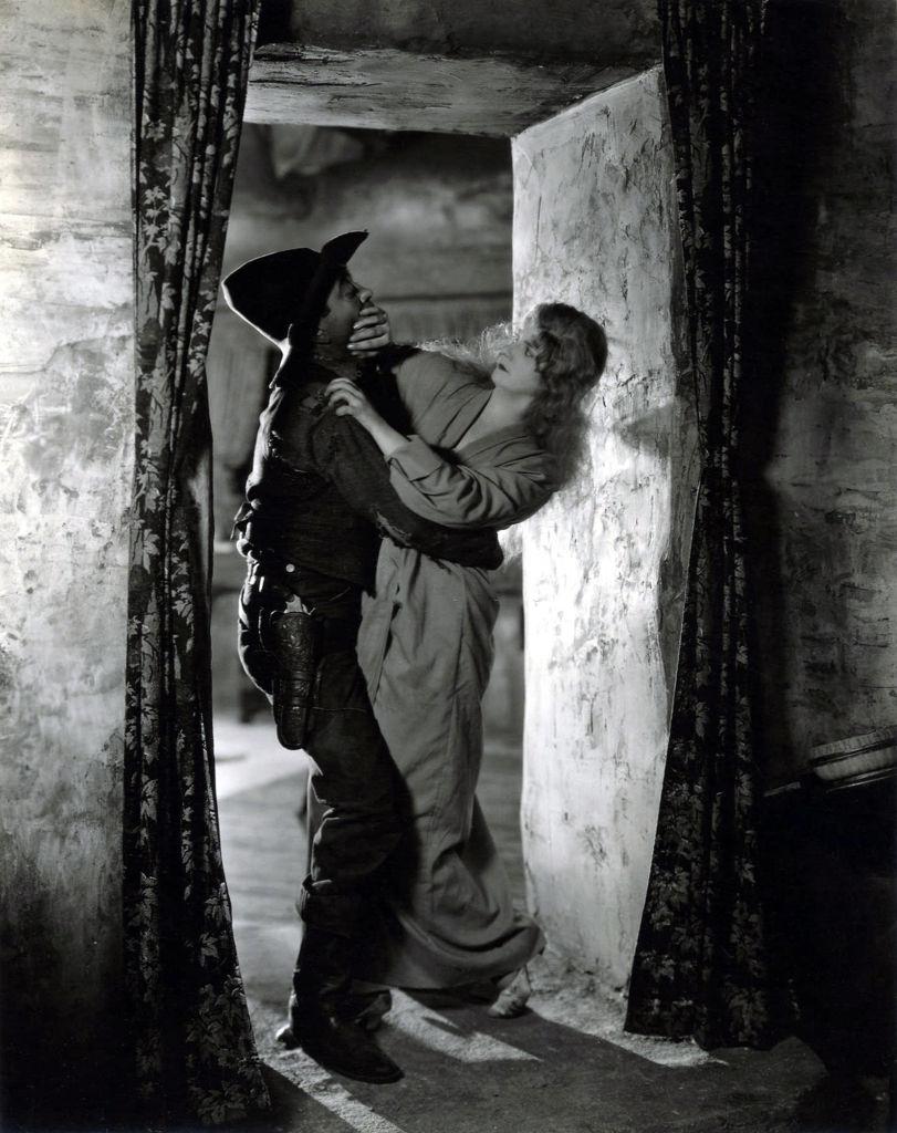 #17 Alice Terry and George Cooper in a scene from the movie “The Great Divide”, 1925.
