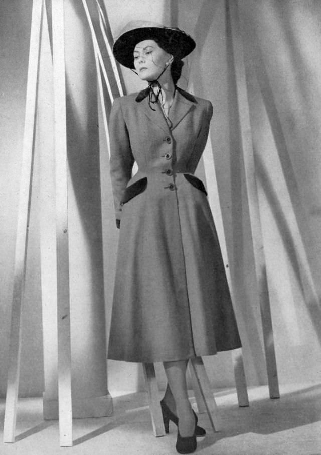 #3 Alla in gray wool redingote with velvet lapels and pockets, by Vera Boréa, 1948