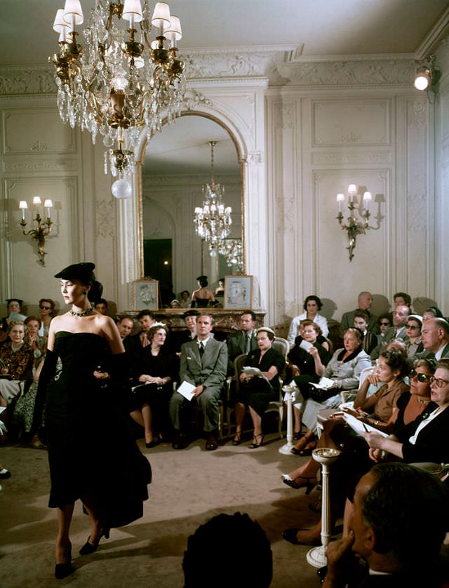 #37 Alla models one of Christian Dior’s cocktail dresses in his salon, Paris, circa 1950s