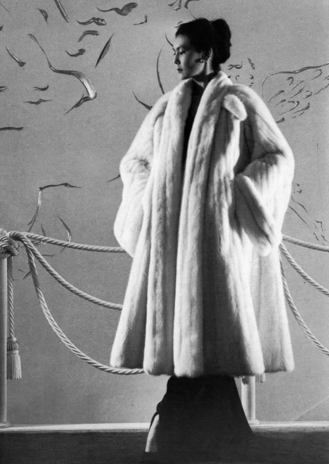 #4 Alla is wearing a coat designed by Dior in Emba mink, the first perfectly white variety of mink, 1948