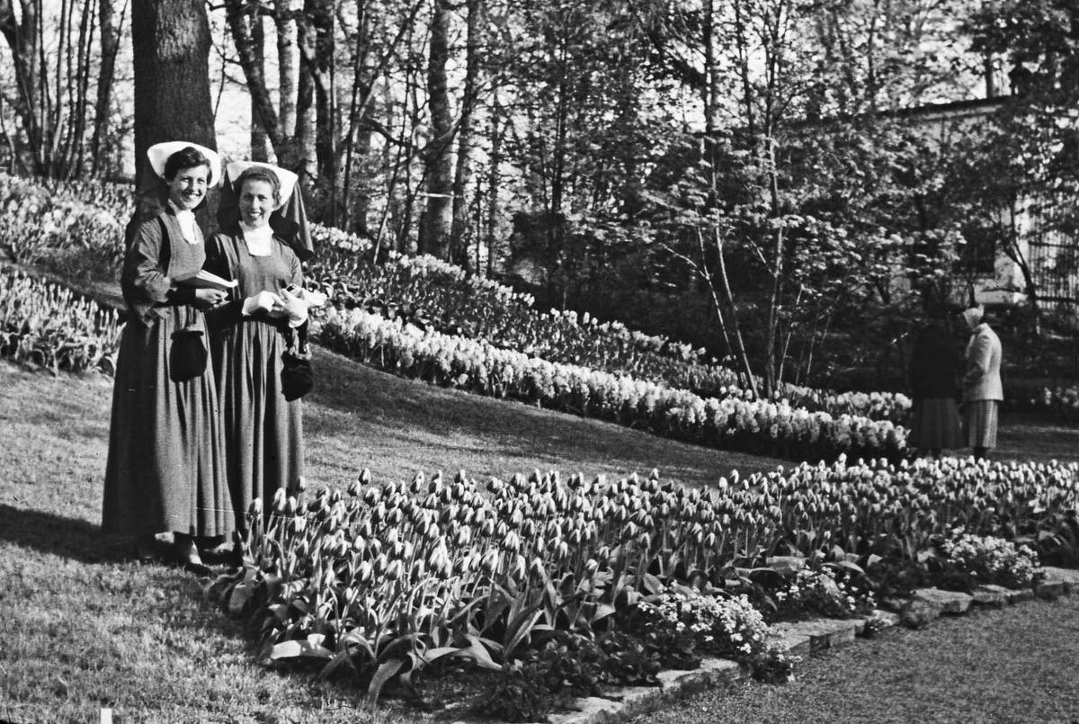 #32 Two nuns enjoying in the park, Amsterdam, 1958.