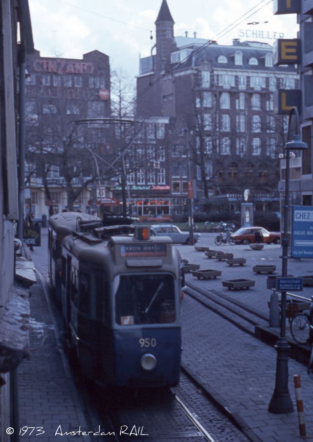 #27 Line 4 through the Bakkersstraat. In the background: Rembrandtplein and Schiller Hotel, February 1973