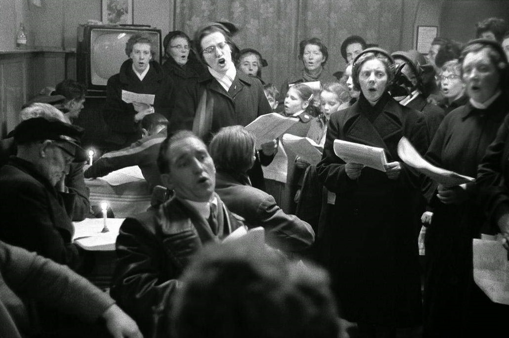 #25 Salvation Army workers sing Christmas songs to homeless men, Amsterdam, 1964