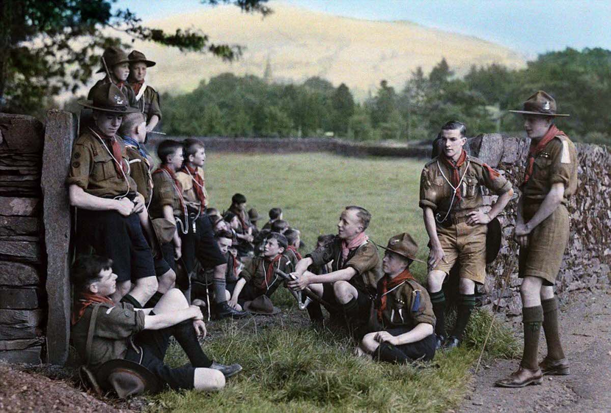 #33 English Boy Scouts on a hike stop for a rest near Ambleside, north-west of Windermere in Cumbria in 1929.