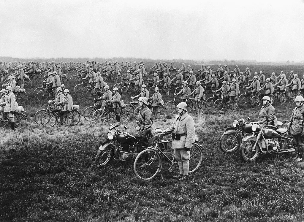 #13 The famous Dutch bicycle regiment at attention in Amsterdam, 1940.