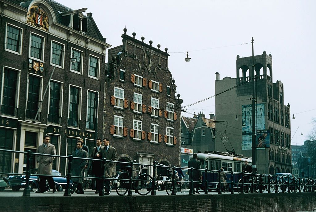 #15 A street by a canal in Amsterdam with bicyles, 1965.