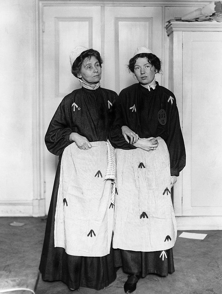 #14 Emmeline Pankhurst and her daughter Christabel whilst in prison for their militant campaigning, 1908.