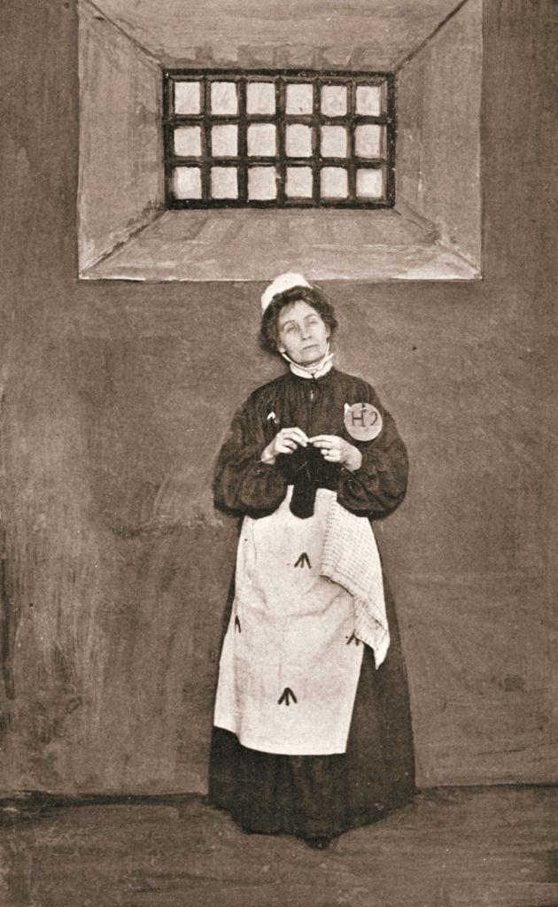#29 Emmeline Pankhurst, in a cell in Holloway Prison, London, 1908.