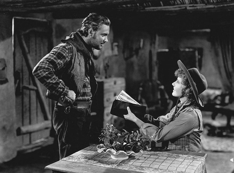 #41 Jean Arthur with William Holden in the movie ‘Western Arizona’, 1940.