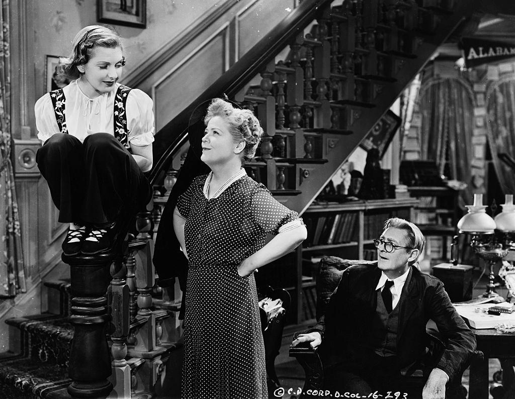 #65 Jean Arthur as granddaughter Alice Sycamore, Spring Byington as daughter Penny Sycamore, and Lionel Barrymore as Grandfather Martin Vanderhof in the 1938 movie ‘You Can’t Take It with You’.