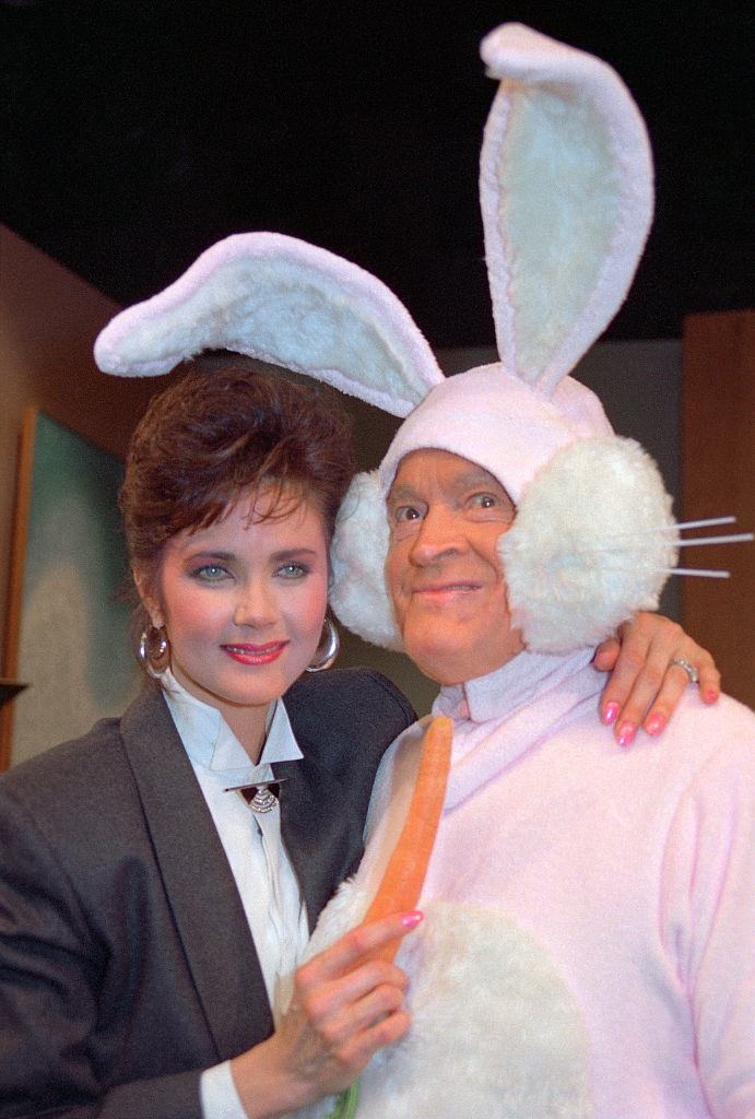 #38 Lynda Carter with Bob Hope, 1987.
