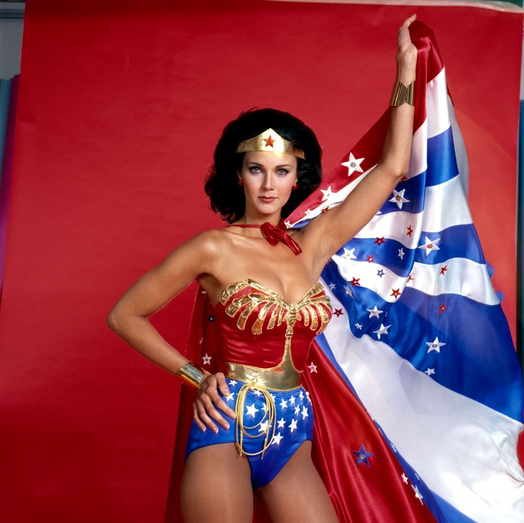 #65 Lynda Carter as Wonder Woman posing for a publicity shot, 1977.