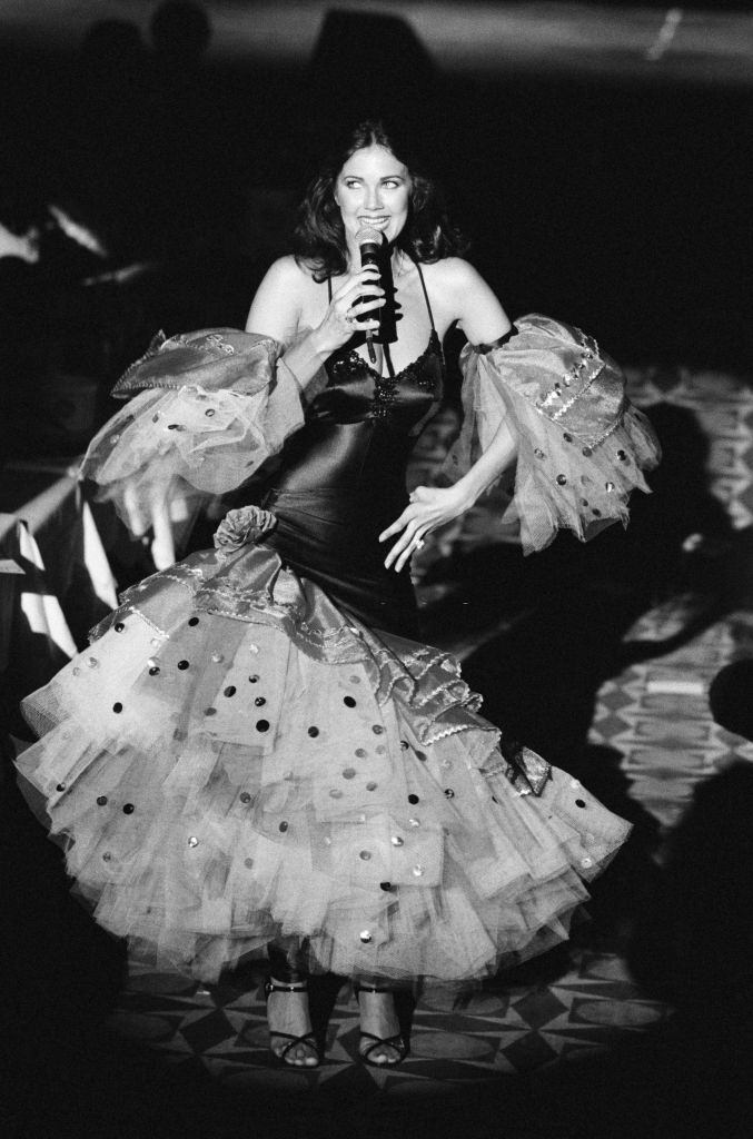 #33 Lynda Carter singing in a Concert.