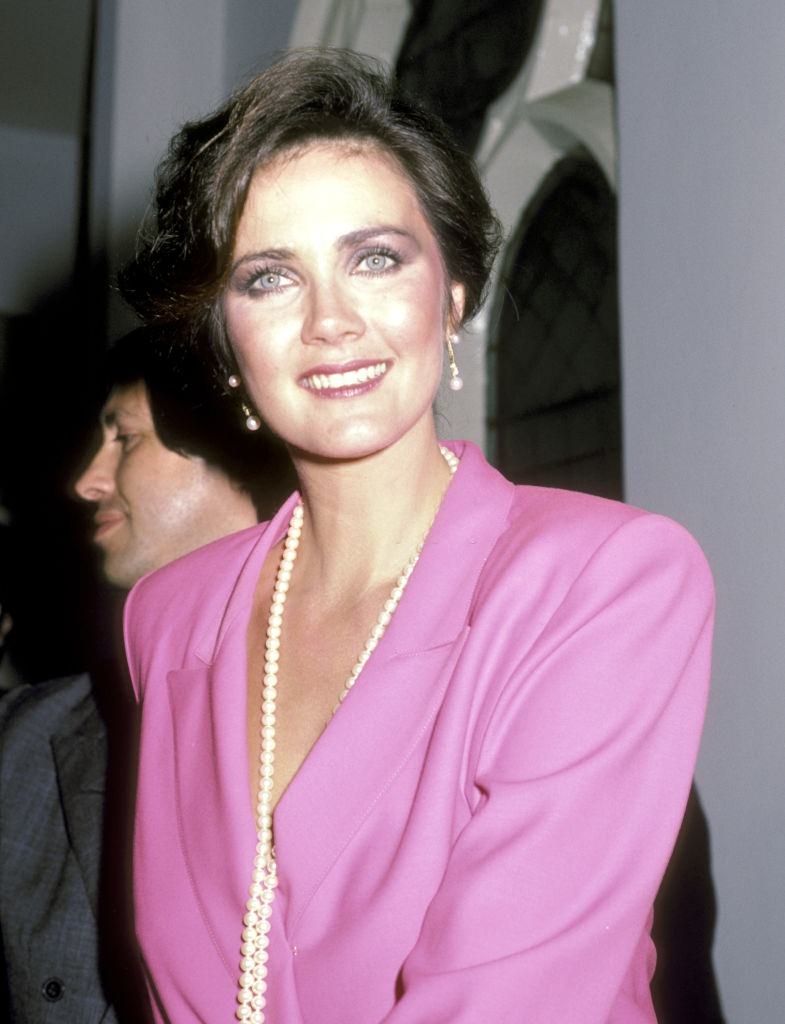 #70 Lynda Carter in pink dress at variety show ‘Body and Soul’, 1984.