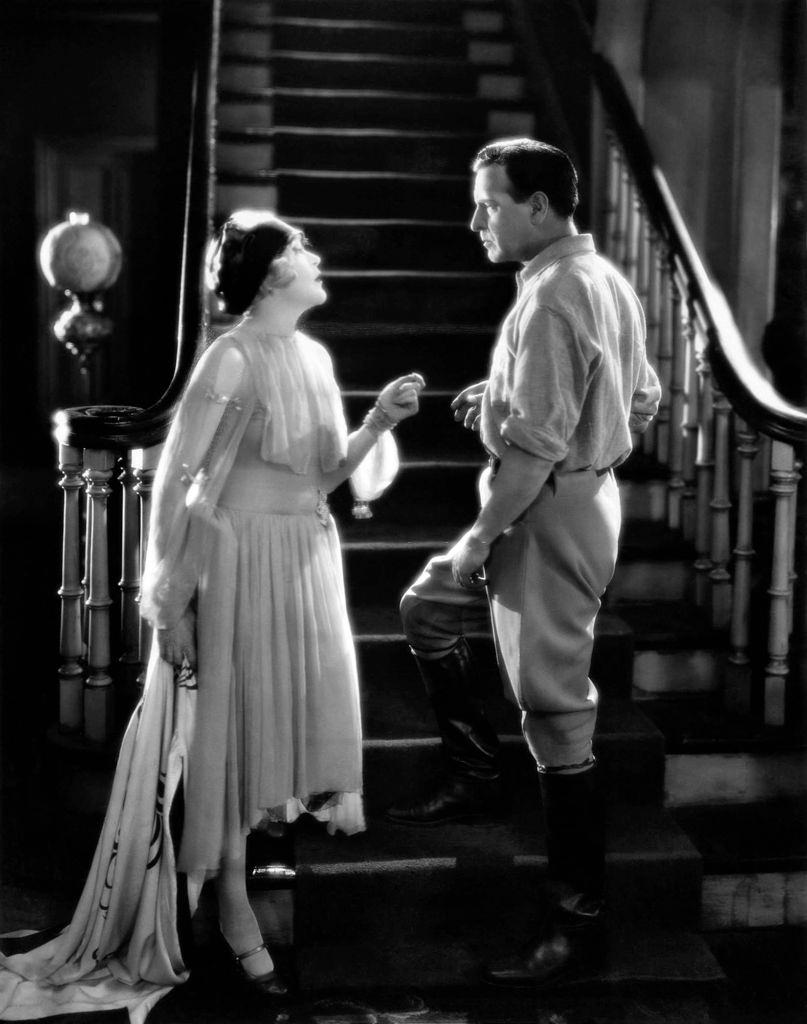#48 Mae Murray and Conway Tearle in a scene from the movie ‘Altars of Desire’, 1927.