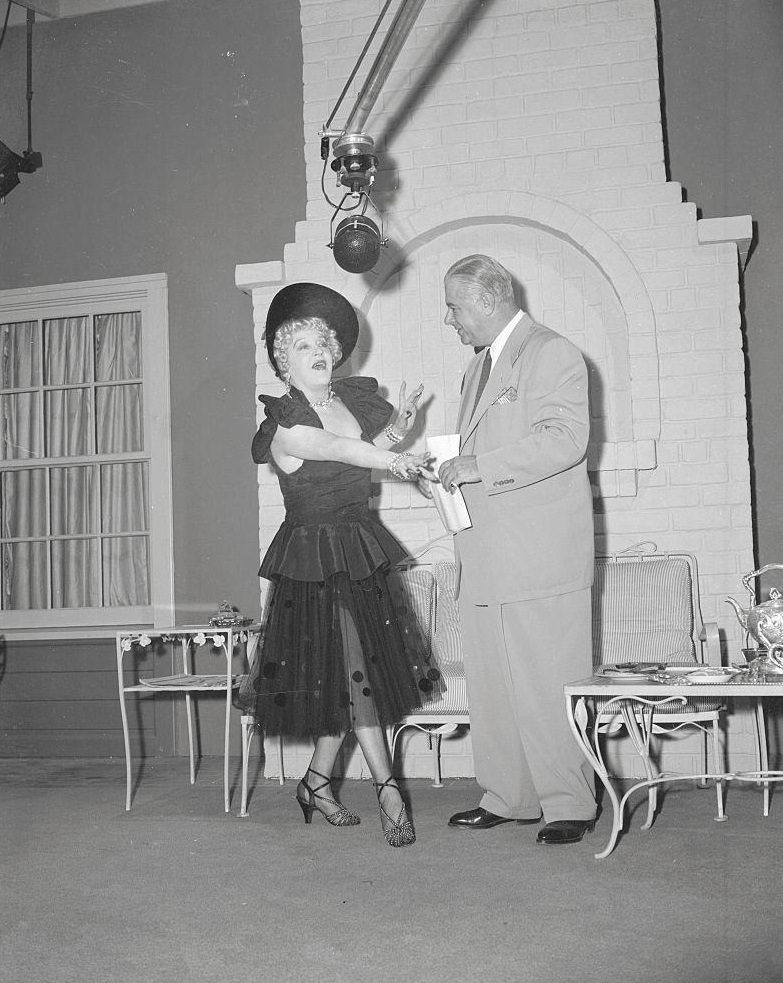 #51 Mae Murray Conversing with Director Ralph Staub, 1950.