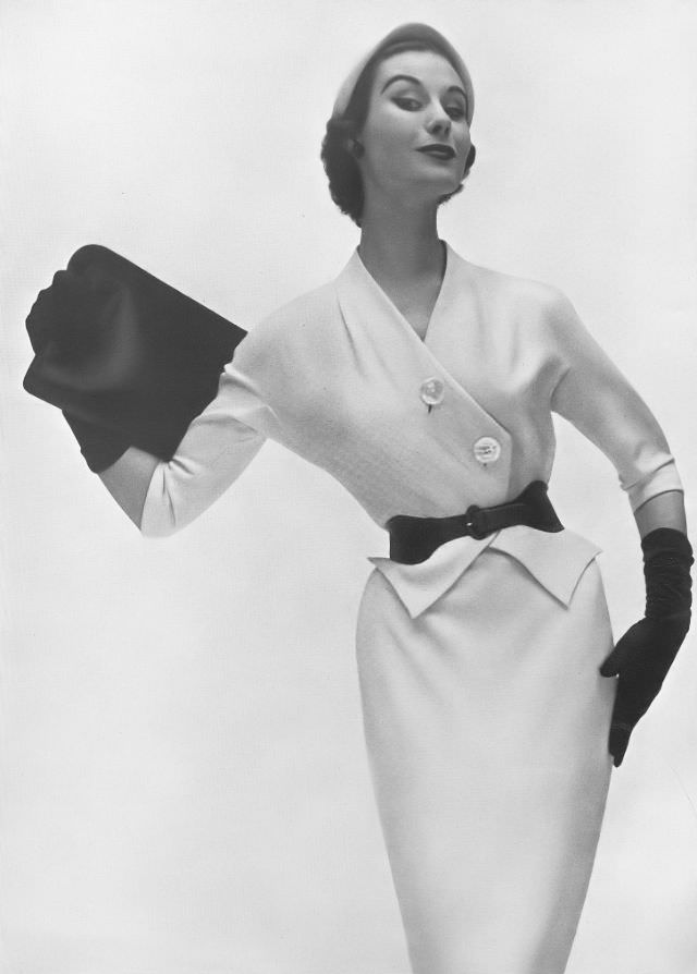 #20 Myrtle Crawford in ivory-white woolen day dress contrasted with black belt by Matita, Harper’s Bazaar UK, February 1953