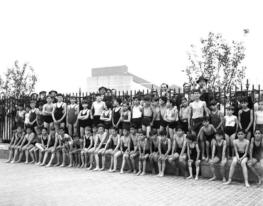 #17 A group of young children are pictured above while waiting for the new pool at Thomas Jefferson Park to open on June 27, 1936 in East Harlem, New York.
