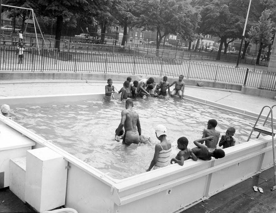 #19 A temporary pool inside the formerly named Tompkins Park in Brooklyn on August 10, 1966.