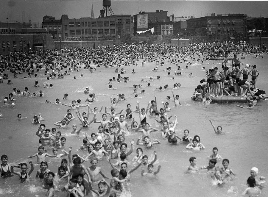 #22 A super-crowded McCarren Park pool in Brooklyn during the summer of 1937; the park and pool still exist today.