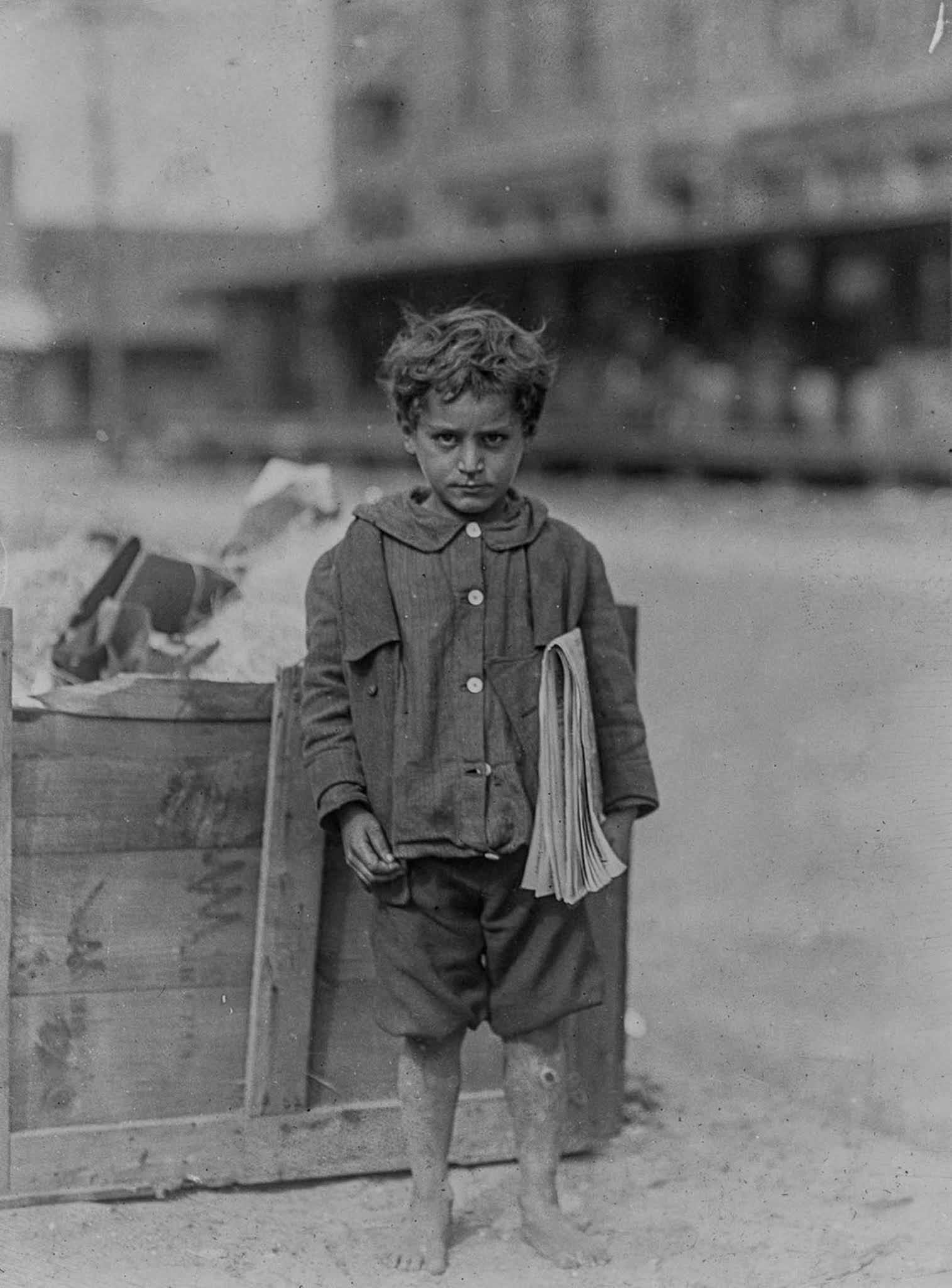 #2 One of America’s youngest newsboys. Four years old and regular seller. Tampa, Florida, 1913.
