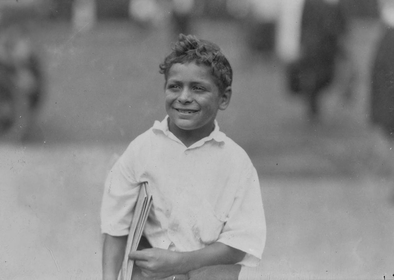 #6 Patsy, 8-year-old newsboy. Says he makes 50 cents a day. Newark, New Jersey, 1924.