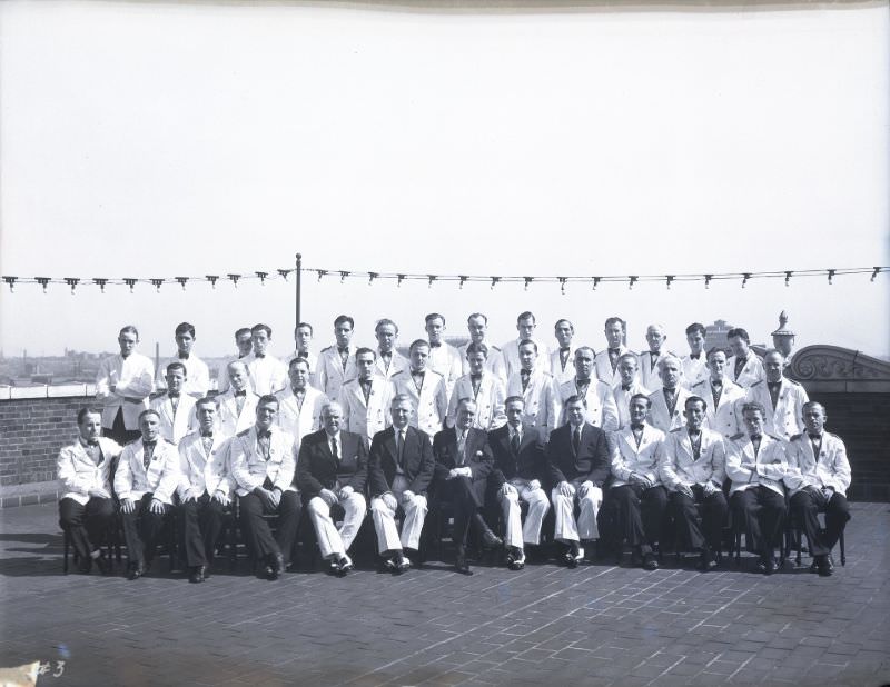 #11 Group portrait of Chase Hotel waiters, posed on the hotel’s roof, May 1931