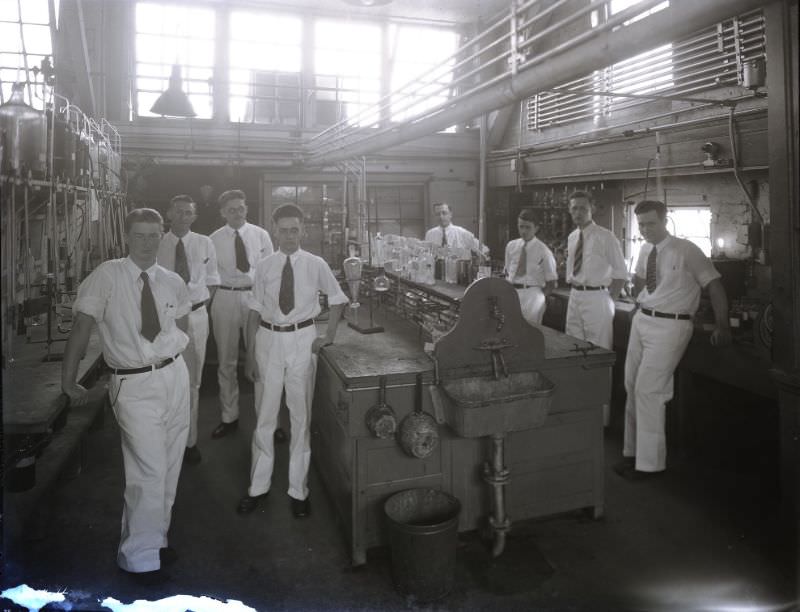#15 Monsanto Chemical Works employees posed in a chemical laboratory at the Monsanto plant at the corner of 2nd and Lafayette, June 1931