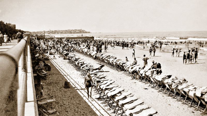 #23 View south towards Old Jaffa as allied troops and crowds of local Telavivians enjoy a beautiful sunny day on the beach at Tel-Aviv, Palestine (now Israel), July 1942