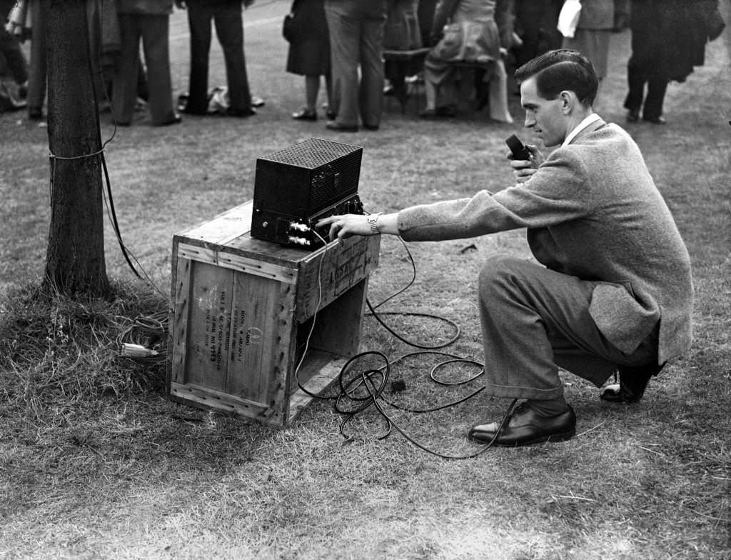 #12 London Olympic Games 1948. A radio outside-broadcaster prepares his equipment.