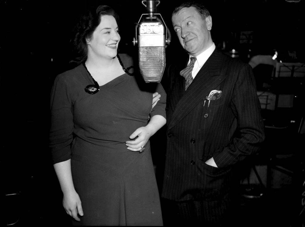 #15 Tommy Handley and Hattie Jacques, during rehearsals for the radio show “ITMA” in London, 25th September 1947.