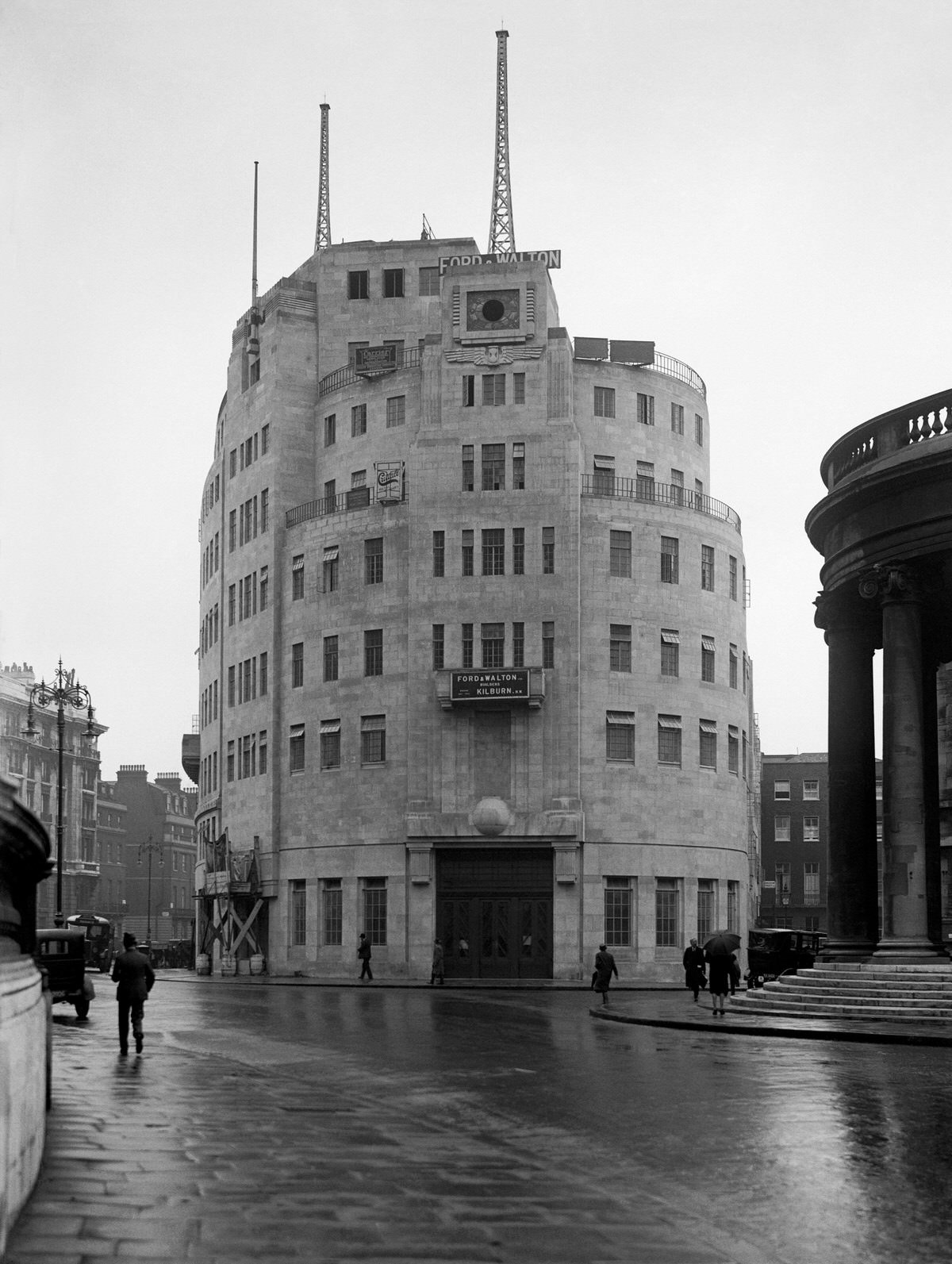 #5 A view of the newly-built BBC Broadcasting House in a wet central London, 1931.
