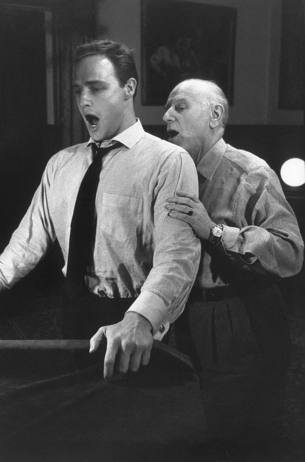 #11 Marlon Brando practices with his singing coach for his role in “Guys and Dolls,” Goldwyn Studios, 1955