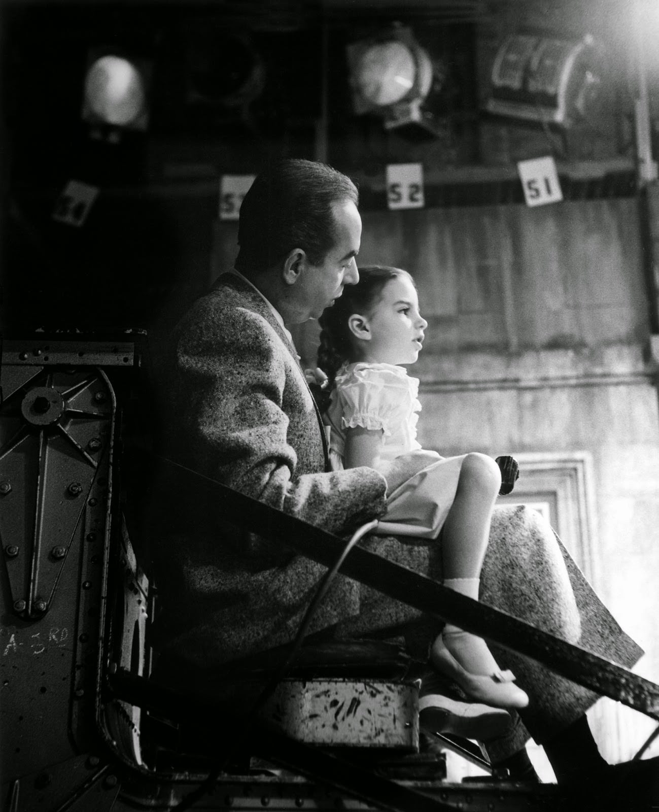 #13 Vincente Minnelli high on the Chapman crane, takes his daughter Liza Minnelli for a ride on the MGM set of “Lovely to Look At,” 1951