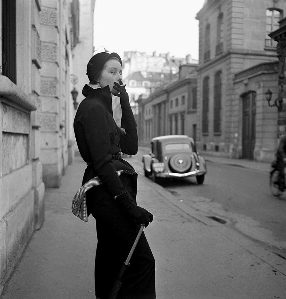 #55 Bettina Graziani wearing a suit by Jacques Fath, 1949