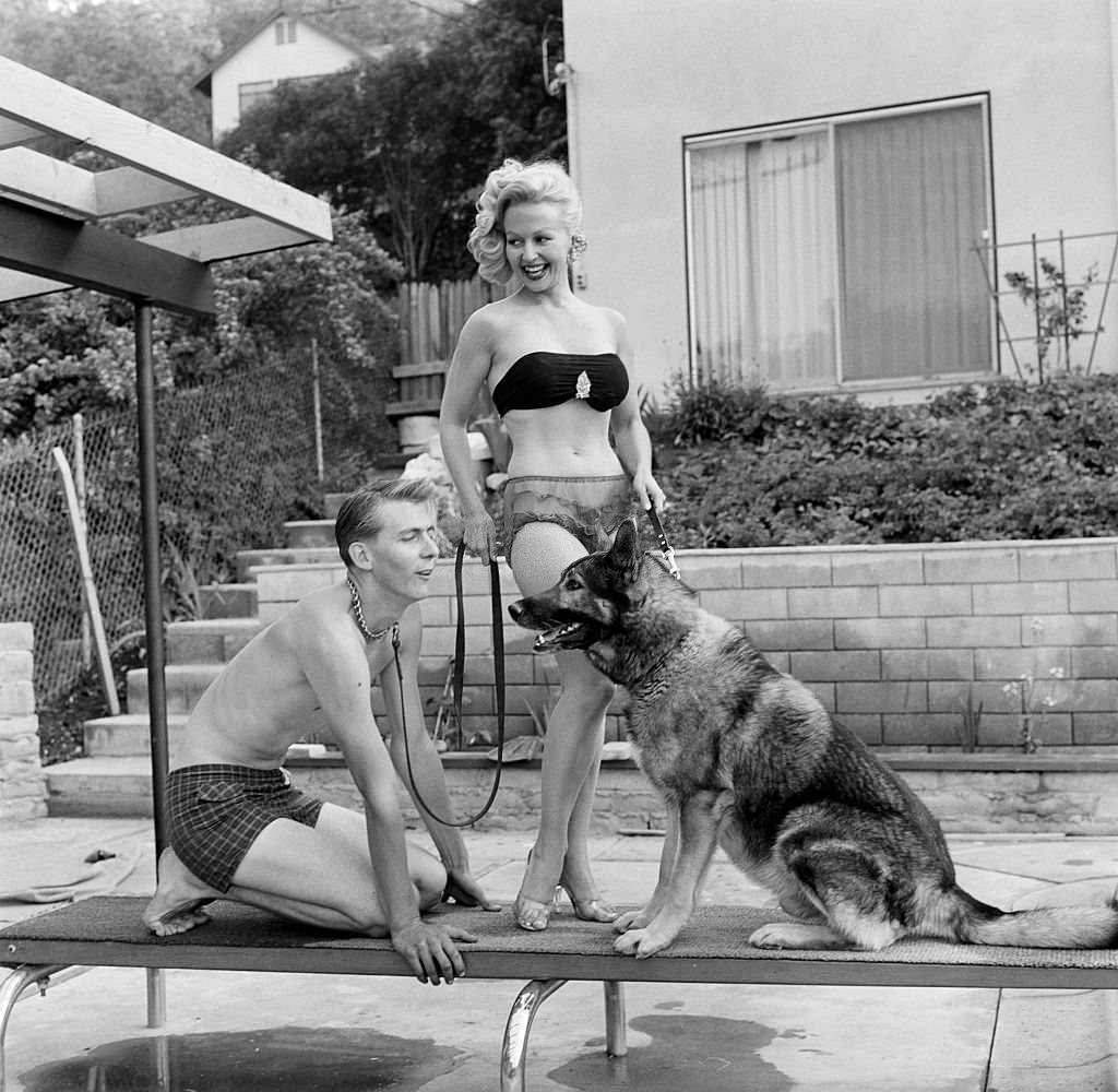 #53 Greta Thyssen with a dog, 1956.