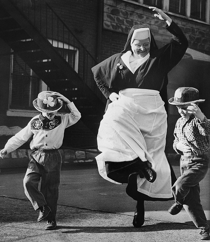 #24 Nun dancing with children, 1964