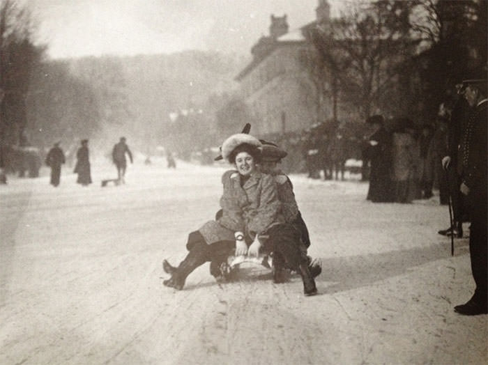 #55 A young woman goes sledding at buxton in the english peak district, 1904